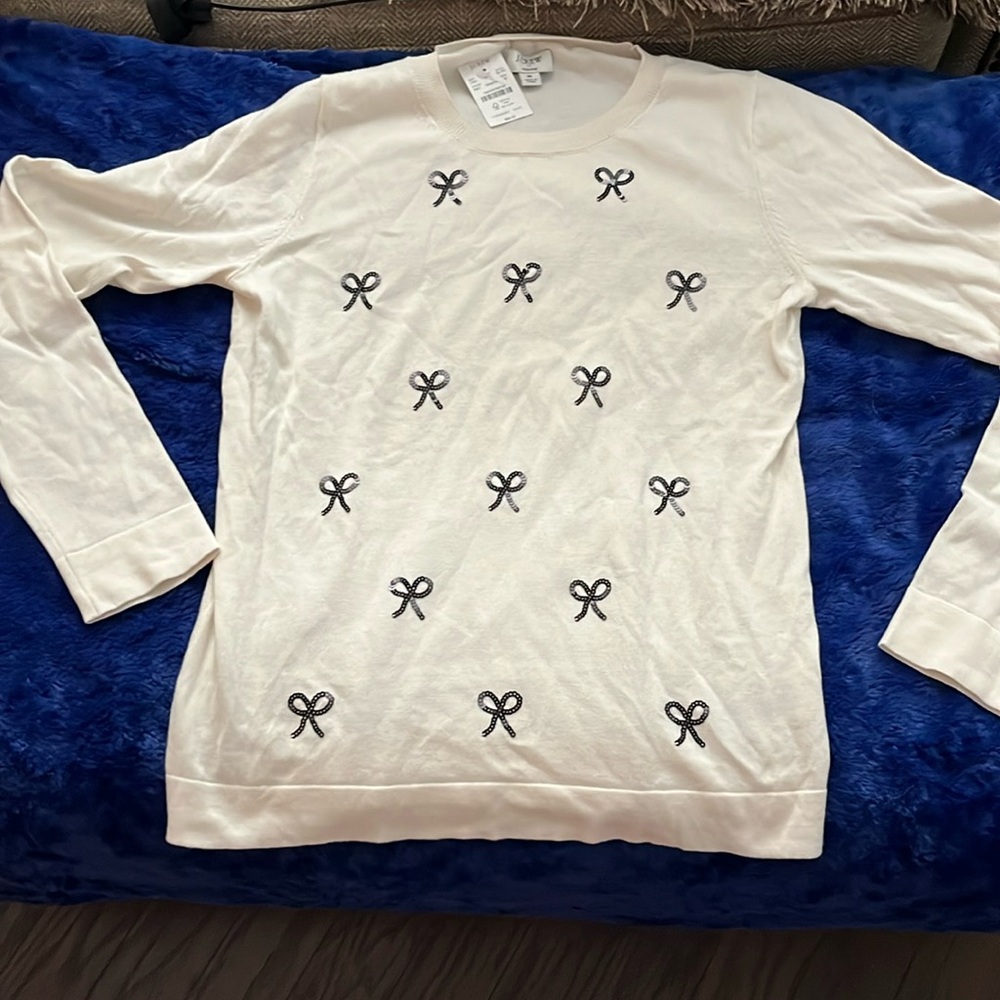 J Crew Woman’s Medium Long Sleeve Shirt with bows. New, never worn.